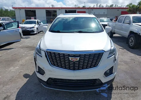 2022 Cadillac Xt5 Fwd Premium Luxury from USA, damaged, VIN 1GYKNCRS3NZ182709